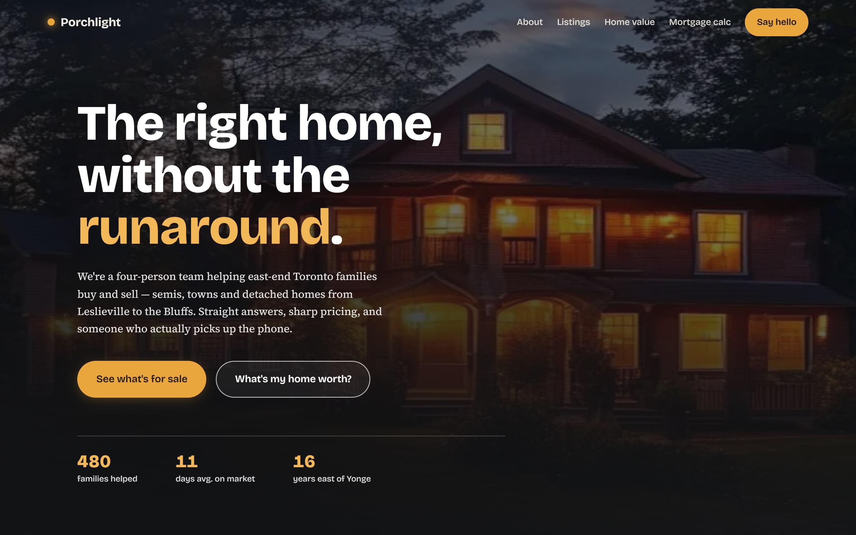 The Porchlight Realty website on a laptop